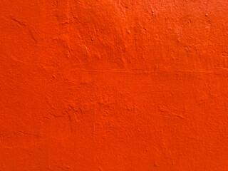 Red-orange stucco texture background in Oaxaca, Mexico