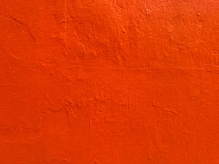 Fotobehang Red-orange stucco texture background in Oaxaca, Mexico © Xhico