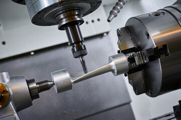 The process of milling a turbine blade on a turning-milling machine