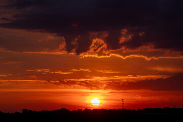 Beautiful Orange sunrise behind clouds over Nebraska