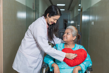 Indian female doctor checking patient at hospital