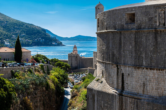 Dubrovnik, Croatia 07-29-2023 The UNCESO world heritage old town of Dubrovnik with spectacular views from the fortified walls over the old town with red roof tops, narrow streets and the Adriatic sea.