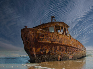 Rusty old ship on the Namibian coastline