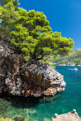 A beautiful bay at the Dalmatian Coastal line close to Dubrovnik with crystal clear and turquoise...