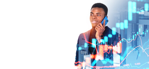 African man on phone in city, financial charts