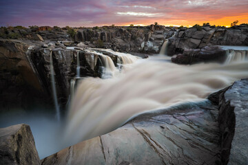 Augrabies waterfall at sunset with artistic motion blur river flow