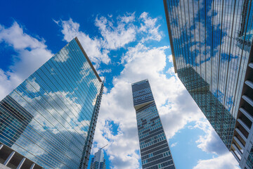 Fototapeta na wymiar Glass skyscrapers against the sky