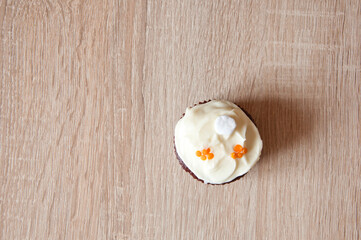 birthday cake. frosting cupcake with cream. homemade cup cake with sprinkles. cupcake dessert. yummy muffin. sweet food. delicious cupcake food. yummy and sweet dessert. confectionery advertisement