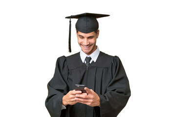 Young university graduate caucasian man over isolated background sending a message with the mobile