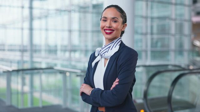 Portrait, flight attendant and arms crossed in airport for travel, journey and help on airplane with professional transport service. Happy, air hostess and working with confidence for global airline
