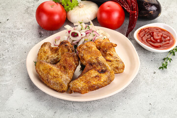 Grilled chicken wings with sauce
