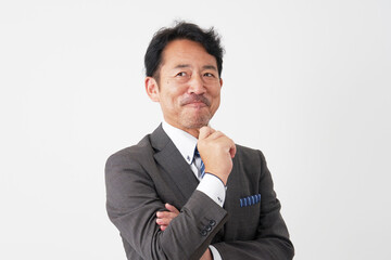 想像するミドルエイジのビジネスマン　白背景