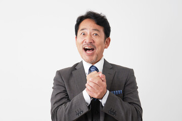 ひらめくミドルエイジのビジネスマン　白背景