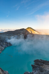 Mount Ijen, a volcano and sulphur mine located near Banyuwangi in East Java, Indonesia. Ijen crater is a famous touristic destination for tourists in Java island, Indonesia.