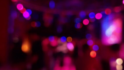 Defocused dancing scene in the night club