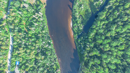 Aerial view of a beautiful Canadian forest river in the province of Quebec