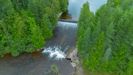 Aerial view of a beautiful Canadian forest river in the province of Quebec