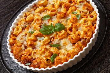 tortellini bake with cheese, tomato sauce, beef