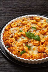 tortellini bake with cheese, tomato sauce, beef