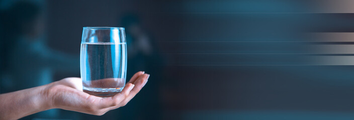 woman hand glass of water