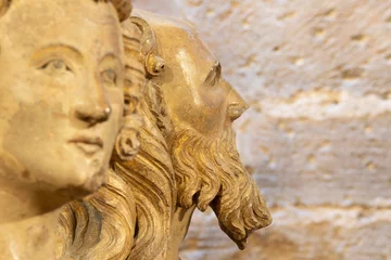 Tuinposter VALENCIA, SPAIN - FEBRUARY 14, 2022: The detail of statue of apostle from Puerta de los Apostloles gate in the Cathedral by Nocolas de Autun from first part of 14. cent.. © Renáta Sedmáková