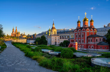 View of churches of Varvarka,  Saint Basil's Cathedral and Zaryadye Park in Moscow, Russia. Architecture and landmarks of Moscow. Sunrise cityscape of Moscow.