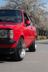 Red vintage sports car on the road
