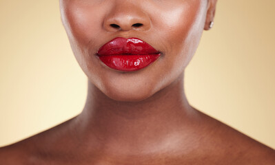Red, lipstick and woman, beauty and makeup with closeup, skin and shine isolated on studio...