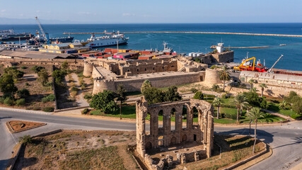 Famagusta, Northern Cyprus - Aerial view of Famagusta (Gazimagusa), View on the Famagusta Port from The Old town wall of Famagusta , Palm Beach, Othello castle - obrazy, fototapety, plakaty