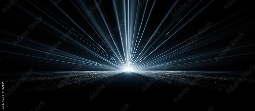 Poster close up view of a light ray on a black backdrop