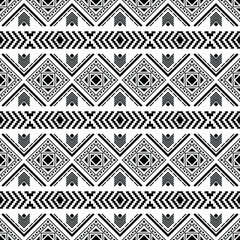 Geometric stripes ethnic pattern in black and white colors. Aztec and Navajo tribal abstract vector illustration. Design for textile template and print fabric.