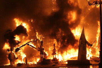 Burning Fallas monuments at night