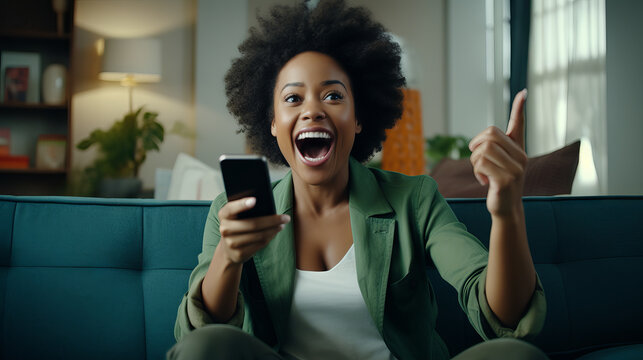 Happy Smiling Screaming Young Afroamerican Female With Black Afro Hair While Holding Her Phone In Front Of Tv Television After Winning Lottery Ticket