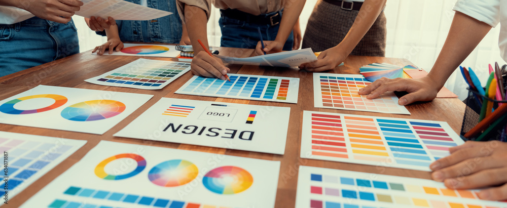 Poster graphic designer brainstorm logo and graphic art at busy creative studio workshop. experiment and br