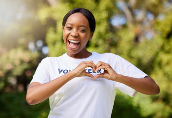 Heart, hands and portrait of volunteer woman with sign for care, support and charity outdoor in nature, forest or environment. Show, love and happy person volunteering in community service in empathy