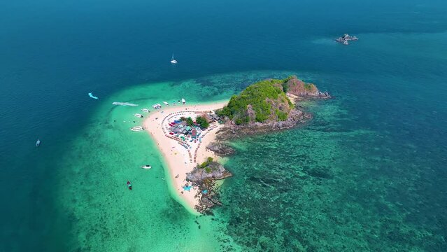 High angle view of Koh Khai Nok near Koh  Khai Nai, white beach and blue sea with tourists on holiday in Phuket, Thailand.
