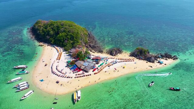 High angle view of Koh Khai Nok, Khai Nai, white beach and blue sea with tourists on holiday in Phuket, Thailand.	