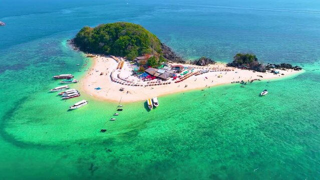 High angle view of Koh Khai Nok, Khai Nai, white beach and blue sea with tourists on holiday in Phuket, Thailand.	