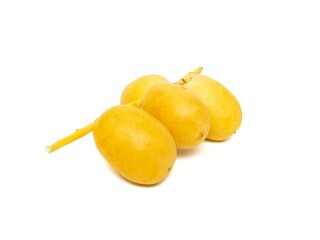 Fresh date palm yellow chemical free placed on a white background.