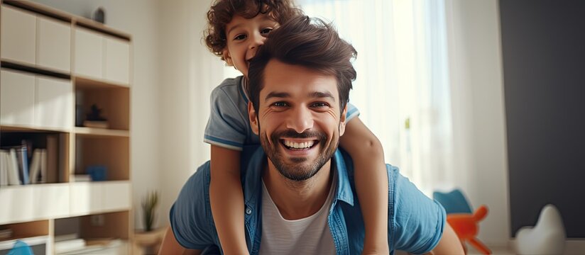 Father and son enjoying playful activities at home with a joyful atmosphere