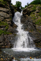 panorama of summer mountains with waterfalls