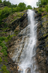 panorama of summer mountains with waterfalls