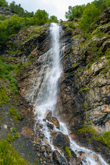 Fototapeta na wymiar panorama of summer mountains with waterfalls
