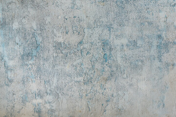 Grungy grainy light blue-gray wooden background