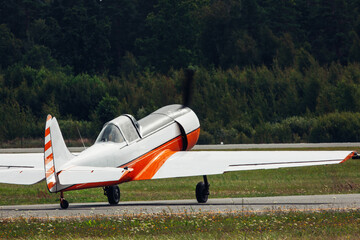 Small aerobatic airplane on the runway