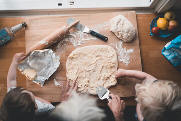 Baking bread with children to create a nice meal for the family