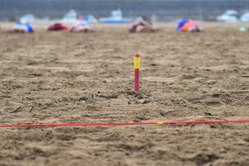 Fototapeta na wymiar Flags event at surf lifesaving competition in Cornwall, UK