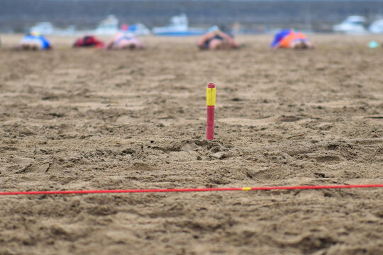 Flags event at surf lifesaving competition in Cornwall, UK