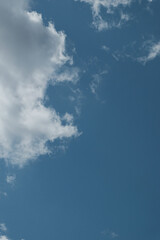 Fototapeta premium Blue sky and white clouds. Background. Layer. Texture. Selective focus. Out of focus. Copy space