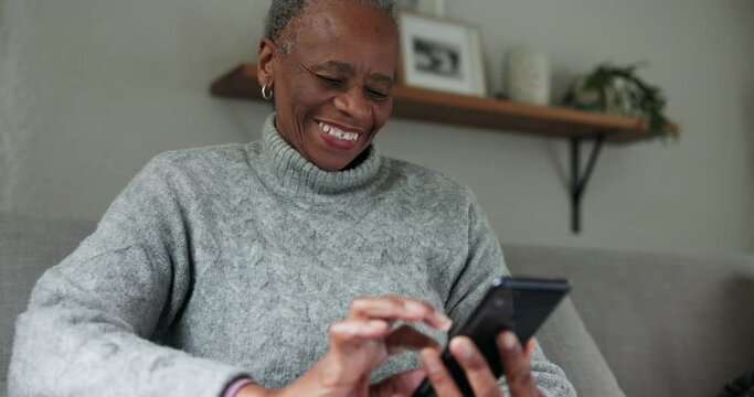 Elderly black woman, smartphone and laughing at chat, typing and communication with social media at home. Using phone, scroll app and internet search, funny text and relax on couch with retirement
